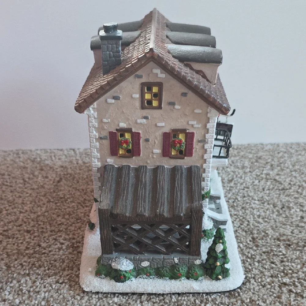 St. Nicholas Square Winter Winery - Festive Village House with Brown Roof